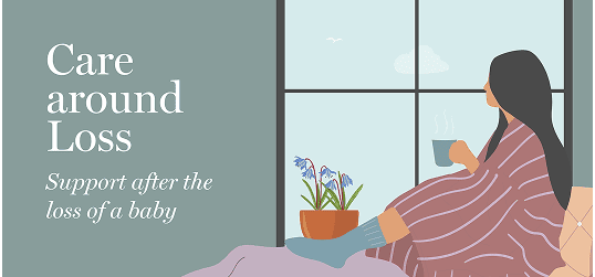 pregnant woman sitting by window with flowers and tea